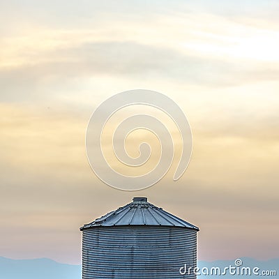 Cylindrical container against cloudy sky in Utah Stock Photo