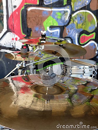 Cymbals on a drumkit with graffiti Stock Photo