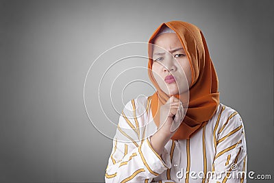 Cynical Muslim Woman Looking to the Side Stock Photo