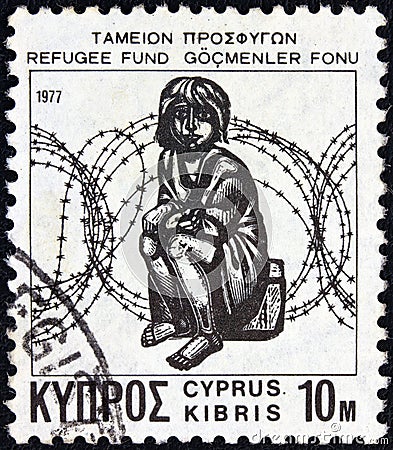 CYPRUS - CIRCA 1977: A stamp printed in Cyprus shows a child in front of barbed wire wood engraving by A. Tassos Editorial Stock Photo
