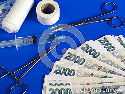 Czech crowns with syringe and surgical tools Stock Photo