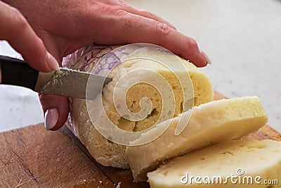 Czech yeast dumpling sliced into wheels and put into a steaming pot to keep the dumpling hot Stock Photo