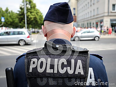 Polish policemen in action, white helmets, plastic covers Editorial Stock Photo
