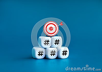 3d goal target icon on top of white cube block stack pyramid shape with hashtag icon symbol blocks. Stock Photo