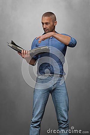3D handsome modern urban fantasy man holding a book Stock Photo
