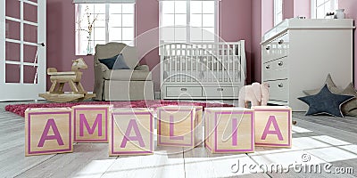 The name amalia written with wooden toy cubes in children`s room Stock Photo