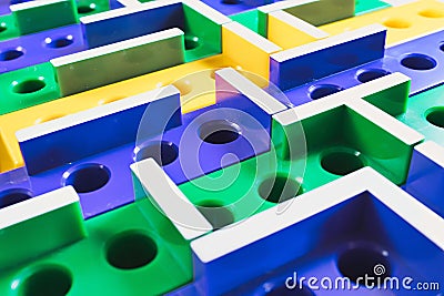 3D Maze coloured plastic board game Stock Photo