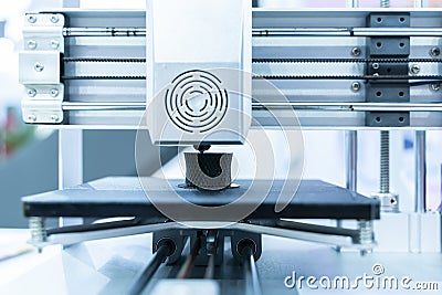 3D printer or additive manufacturing and robotic automation technology Stock Photo