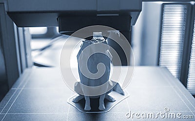 3D printer close-up Process working of 3D printer. 3D printer printing object Stock Photo