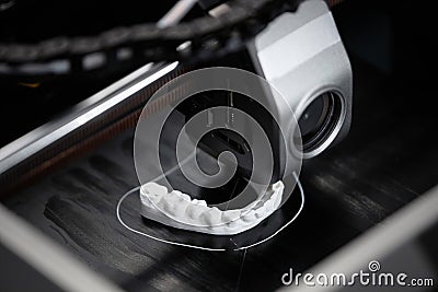 3D Printer Creating Dental Model Stock Photo