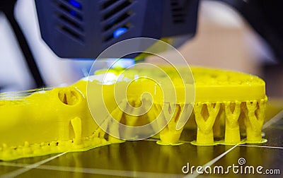 3D printer printing object close-up. Process creating three-dimensional model Stock Photo