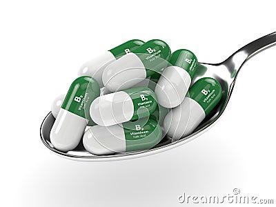 3d render of B9 folic acid pills on spoon Stock Photo