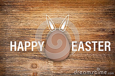 3d render of brown egg and the text Happy Easter Stock Photo