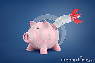 3d rendering of big pink piggy bank stands with a small retro rocket broken and stuck inside its side. Stock Photo