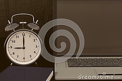 3D rendering of a clock, laptop and book for studies for works Stock Photo