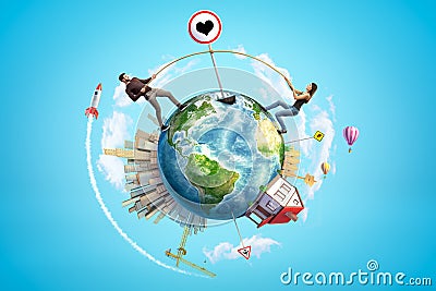 3d rendering of colored earth globe with man and woman holding on to traffic love sign, city buildings, air balloons and Stock Photo