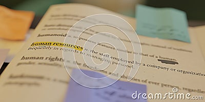 3D rendering of the definition of human resources in a dictionary, which has been annotated Stock Photo