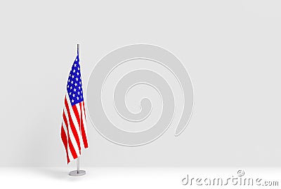 3d rendering. folding United State of America National flag poles podium on empty gray cement wall stage background. Stock Photo