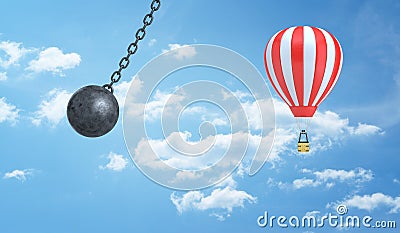 3d rendering of a giant wrecking ball dangerously swings near a striped hot air balloon on a clouded sky background. Stock Photo