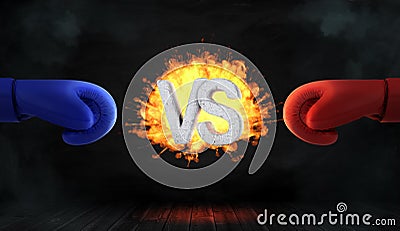 3d rendering of glowing blast with concrete letters VS stands between a red and a blue boxing glove. Stock Photo