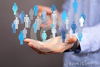 3D rendering of a group of floating people icons on a businessman's hand Stock Photo