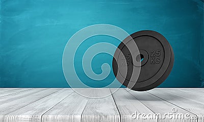 3d rendering of 25 kg weight plate on white wooden floor and dark turquoise background Stock Photo