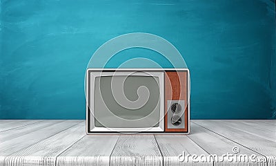 3d rendering of a large old-style CRT TV set in a brown frame standing on a wooden desk. Stock Photo