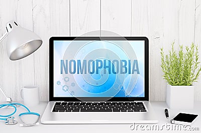 medical desktop computer with nomophobia on screen Stock Photo