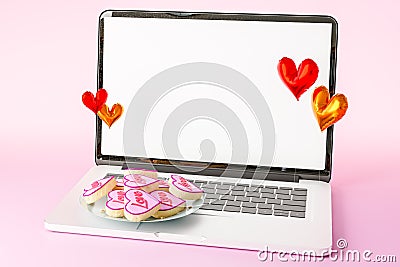 3d rendering of open laptop cookie with heart shaped Stock Photo