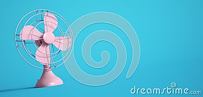 Pink electric fan on blue background Stock Photo