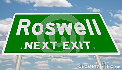 Green highway sign for Roswell next exit Stock Photo