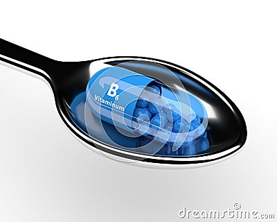 3d vitamin B6 pill on spoon over white Stock Photo