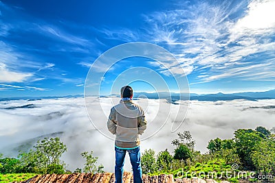 Silhouette young man standing on a high hill scenic rural hometown Editorial Stock Photo