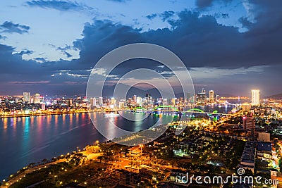 Da Nang city skyline cityscape at Han river at twilight in Da Nang, central Vietnam Stock Photo