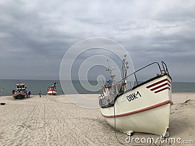 Dabki, Poland 2023 - small fishing boat docked on the beach Editorial Stock Photo