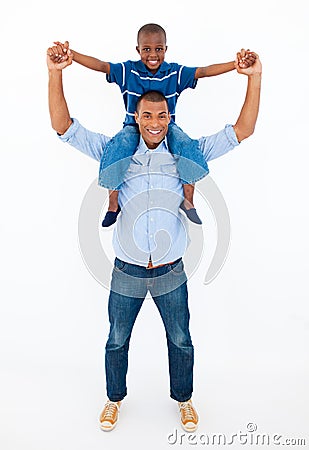 Dad giving son piggyback ride Stock Photo