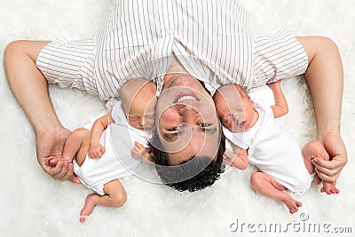 Daddy with twins Stock Photo