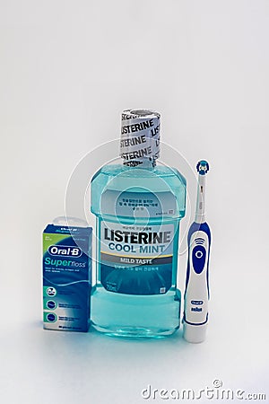 Listerine, Oral-B Floss, and electric toothbrush Editorial Stock Photo