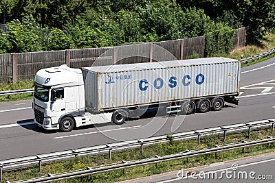 Truck with COSCO container Editorial Stock Photo