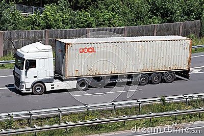 Truck with OOCL container Editorial Stock Photo