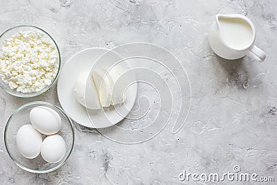 Dairy products for proteic meal on grey background top view mockup Stock Photo