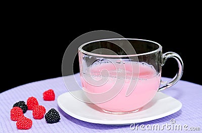 Dairy whey drink in a glass Cup. Black background. Stock Photo