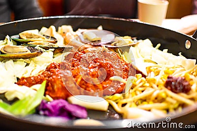 Dakgalbi or Spicy grilled chicken and vegetables recipe. Stock Photo