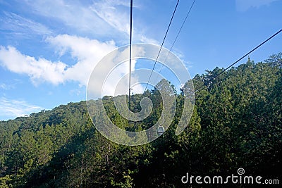 Dalat Cable Car, Route from Robin Hill to Truc Lam Monastery Chua Truc Lam, at Robin Hill, Dalat, Vietnam. pine forest Stock Photo