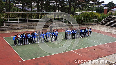Student playing games in shoolyard in Dalat University. Editorial Stock Photo