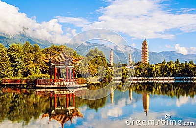 Dali three white pagodas and Cangshan Mountain. Stock Photo