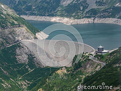 Dam and Reservoir of a Hydroelectric Powerplant in Alpine Landscape - Malta Valley, Carinthia, Austria Stock Photo