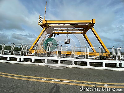 Dam and Reservoir System Gantry Crane used to lift sluice gate valves of the Small Hydro Electric Power generation plant Stock Photo