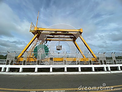 Dam and Reservoir System Gantry Crane used to lift sluice gate valves of the Small Hydro Electric Power generation plant Stock Photo
