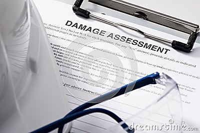 Damage Assessment form on Clipboard Stock Photo